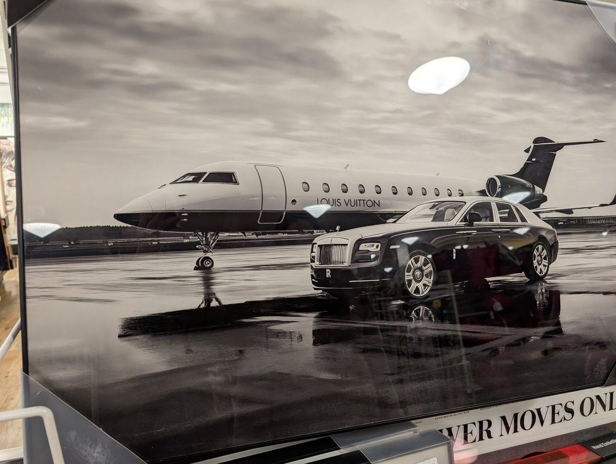 unixpickle's tweet image. Spotted at Home Goods: an AI-generated image for sale to hang on your wall.