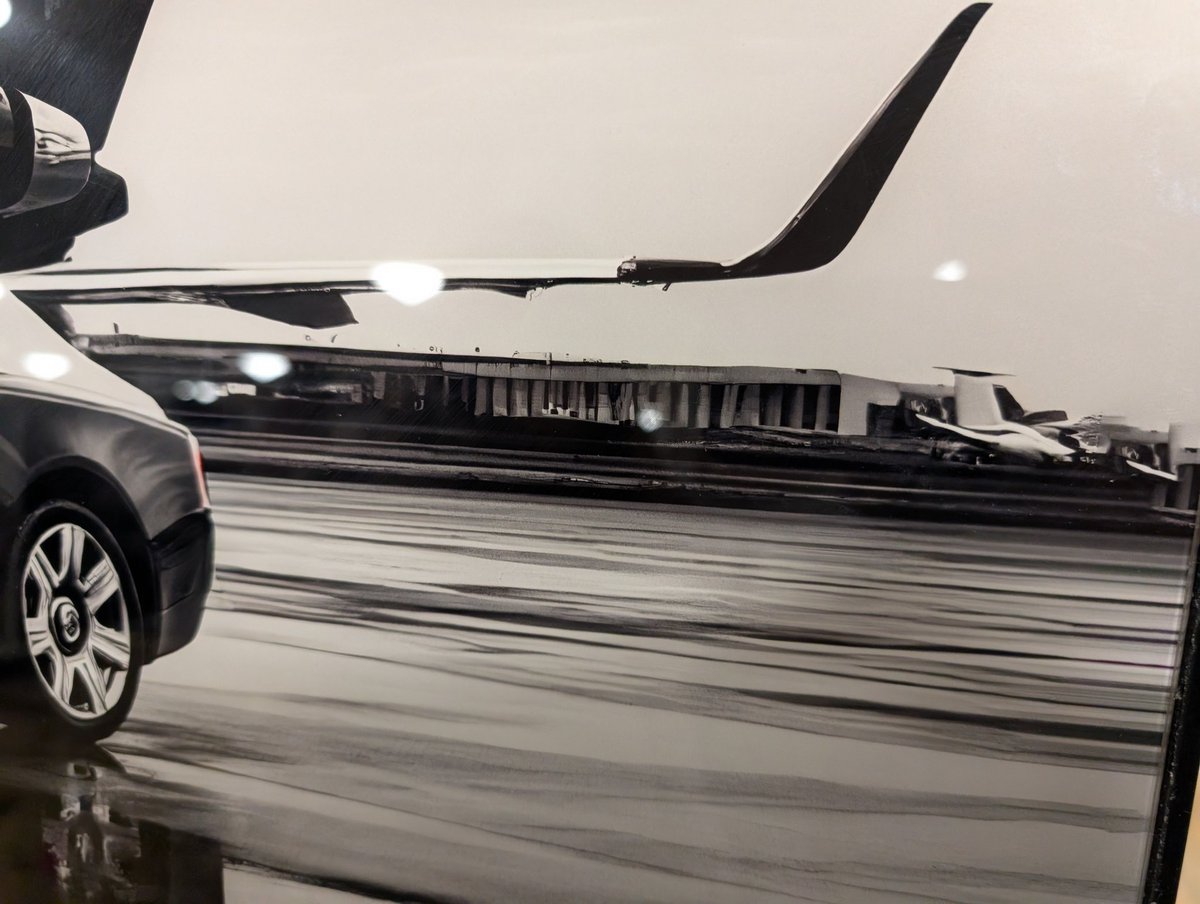 unixpickle's tweet image. Spotted at Home Goods: an AI-generated image for sale to hang on your wall.