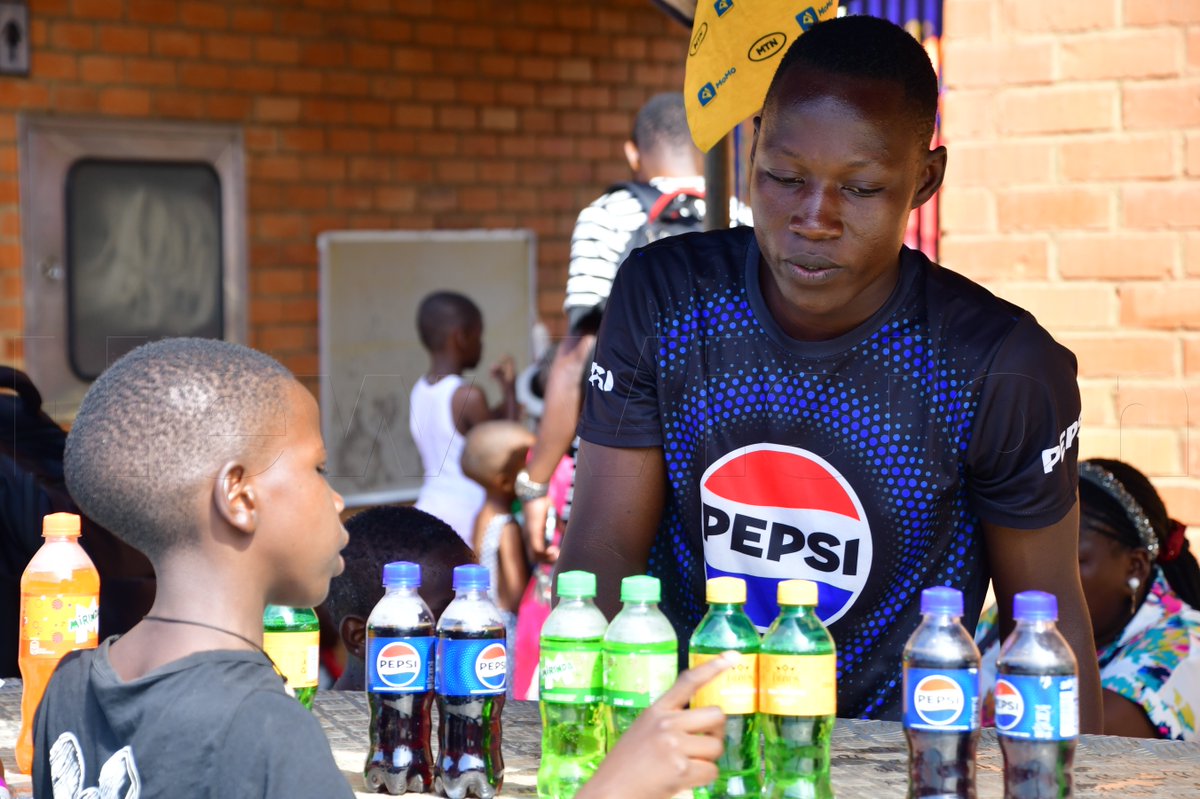 newvisionwire's tweet photo. #TotoChristmasFestival 2025: @PepsiUganda keeping everyone refreshed at the Toto Christmas Festival! 🥤

#VisionUpdates || 📷 Patrick Kibirango https://t.co/VUQTtbXQXg
