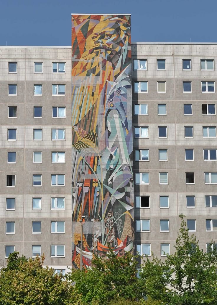 Mosaic in Halle-Neustadt titled "The unity of the German working class as a condition for the effectiveness of its creative power and foundation of the GDR", designed by Josep Renau in 1974.