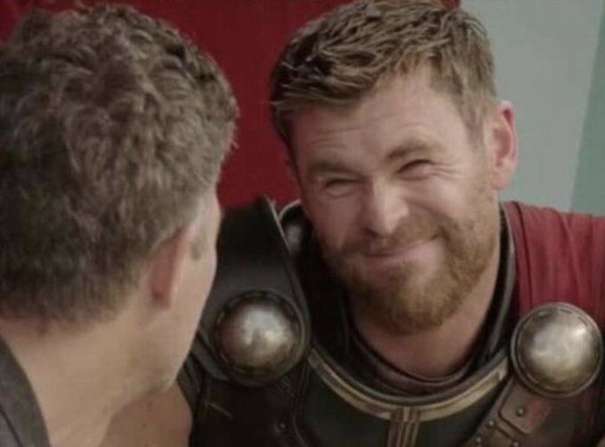 lady in this coffee shop wearing a yale hat and a yale sweatshirt.