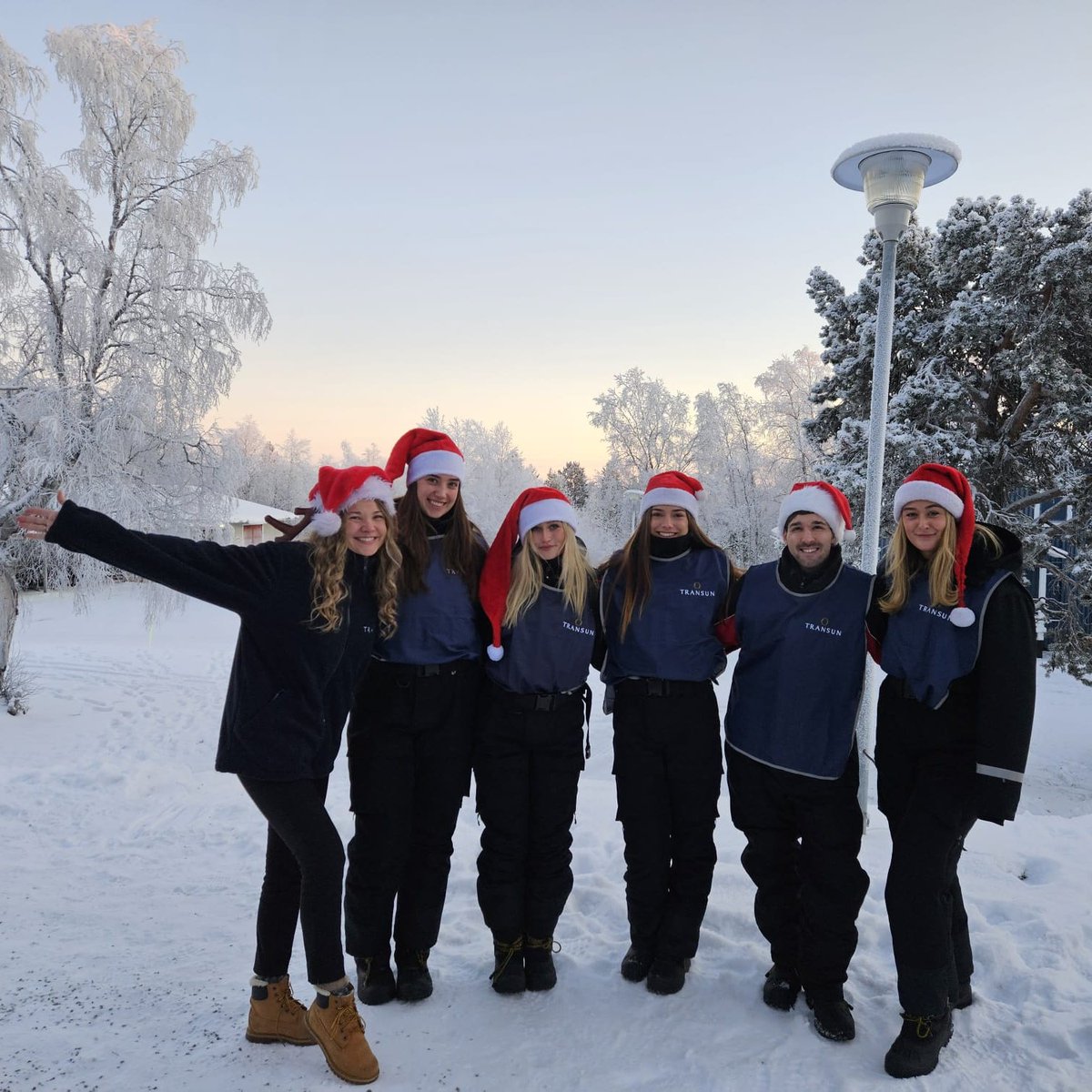 Transun's tweet image. Our Transun reps are ready to spread cheer from the moment you arrive in Lapland this festive season! 🎅🏻 They're among the first friendly faces you'll see and their warm spirit sets the tone for a magical visit amid snow-dusted forests straight out of a Christmas storybook! ❄️