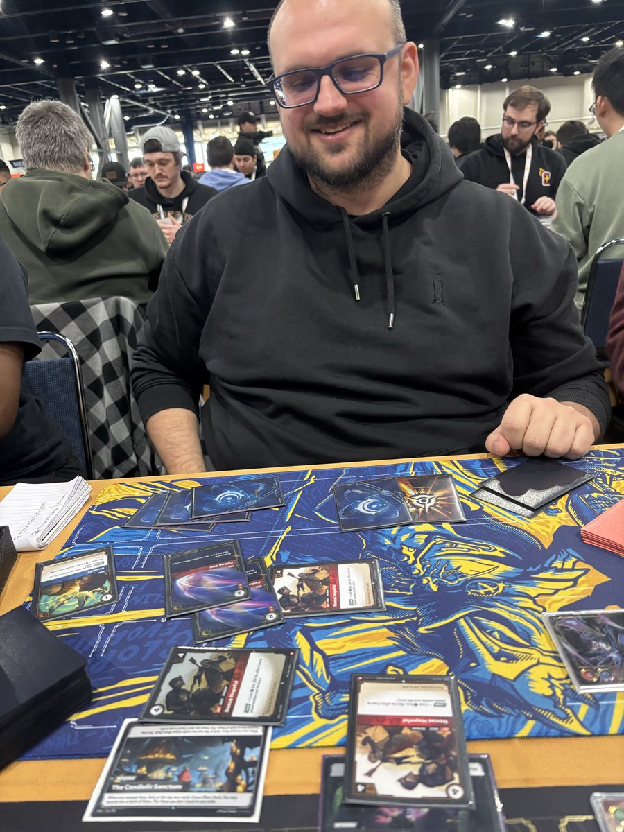 TTvImTri's tweet photo. I have to say despite the rounds taking a while overall the Houston regional was a really fun event to attend. Congratulations to my boy @GhostyTCGs on top 32, I got the honor of playing against a top runeterra player @AlanzqTFT ( he smoked me) then I even got to meet @scarra https://t.co/X32NfjzfT8