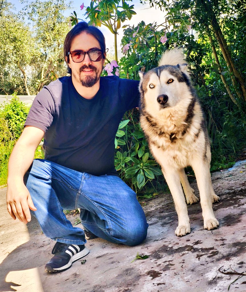 Con mi amigo perro-lobo heterocromático. 🐺