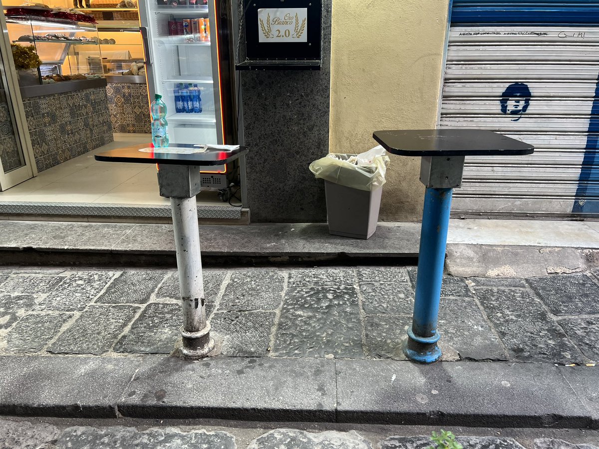 Bollard-top beverage tables are my niche brand of urbanism.