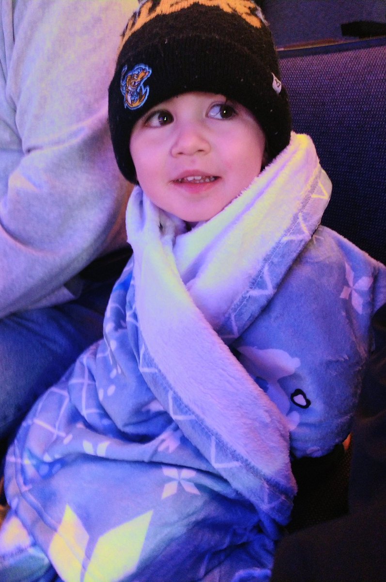 Jack's already had a good night - he got to meet Snoopy wearing his Snoopy sweater plus he got a new Peanuts blanket.  Now it's time for some <a href="/ToledoWalleye/">Toledo Walleye</a> hockey...