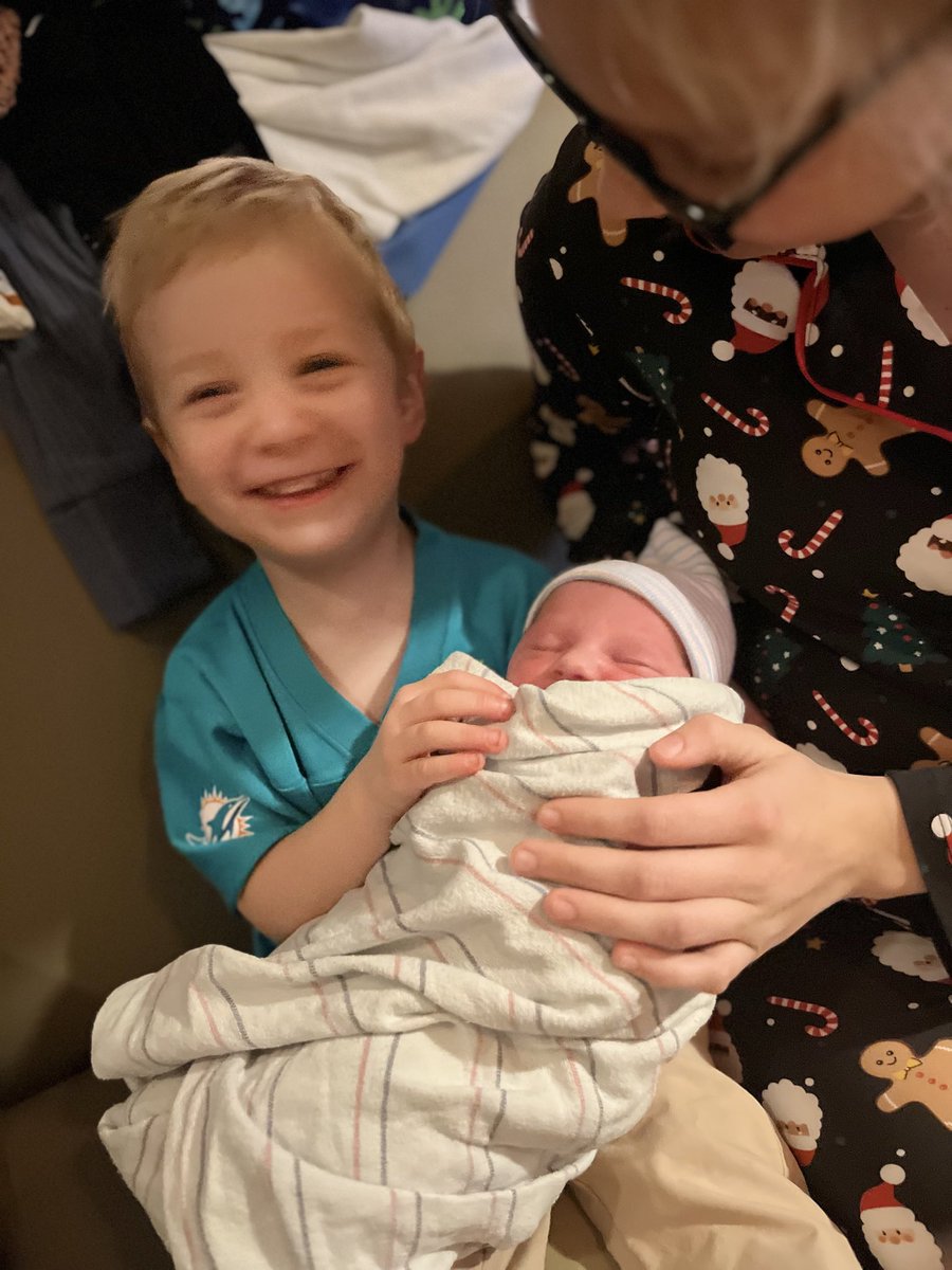 Kathrineee's tweet photo. My newest nephew was just a few hours old &amp; got to see the @MiamiDolphins win! #PhinsUp https://t.co/9PnZ6SmYmO