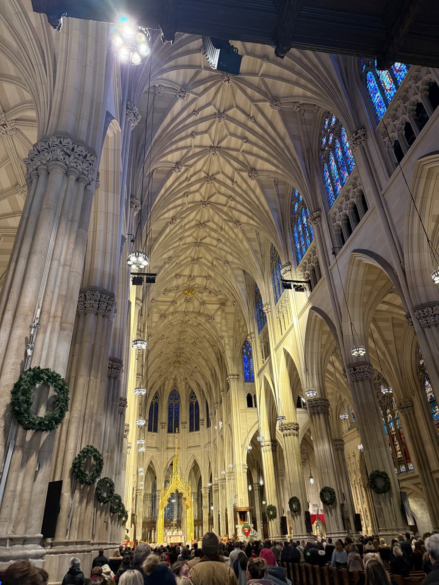 KenneyBaden's tweet photo. The beautiful #StPatricksCathedral NYC hit it just as the Mass #signofpeace hundreds of strangers offer each other peace. Candle lights in honor of my very special people. https://t.co/MZ9EzUmPZq