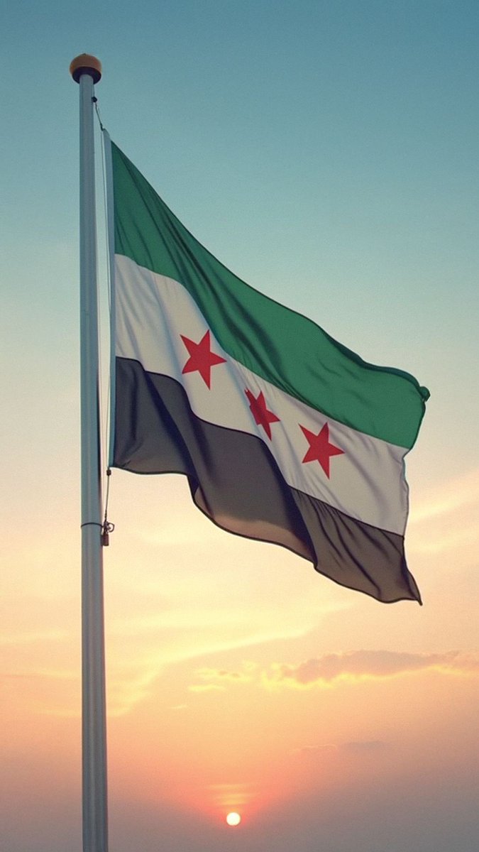 إلى فَجْرٍ تَنفّسَ على حَوْلِ الوِصالِ المَجيد
إلى سُورِيَا، عُمْقَ الجَذرِ، وقَلبَ الأُمِّ النَّابِضِ الحَبِيب
إلى قَداسَةِ التُّربَةِ، المتحرِّرَةِ من دَغَلِها الوَخِيم
إلى الذّاتِ المُنْتَصِرَةِ، مِرْساةِ الكَيَانِ الصَّامِدِ.
إلى سُورِيَا الأبَدِيَّة 🤍