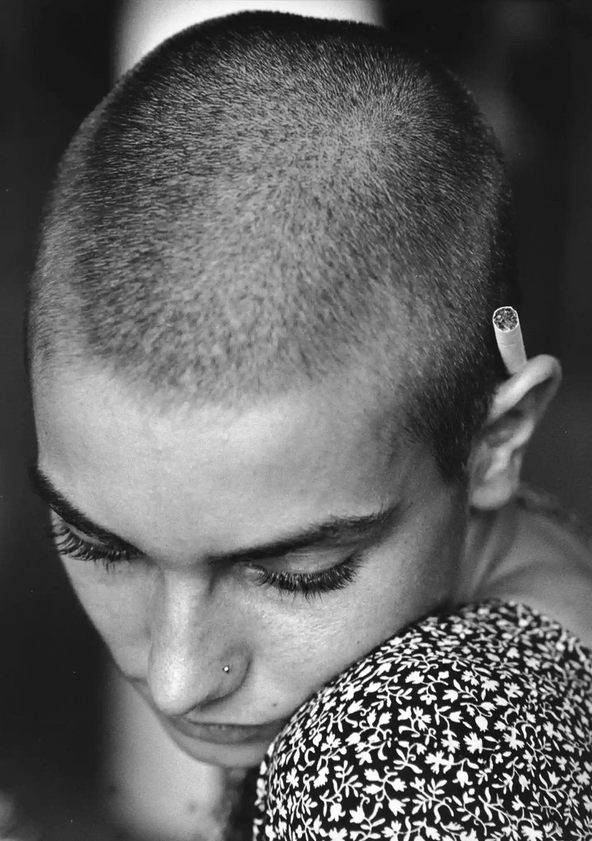 womensart1's tweet image. Remembering Sinead O'Connor on her birthday. Here in 1992 by photographer Jane Bown #WomensArt