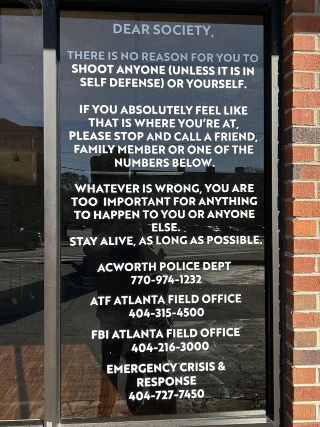 GAFollowers's tweet image. A gun shop in Acworth posted this message on all their windows.
