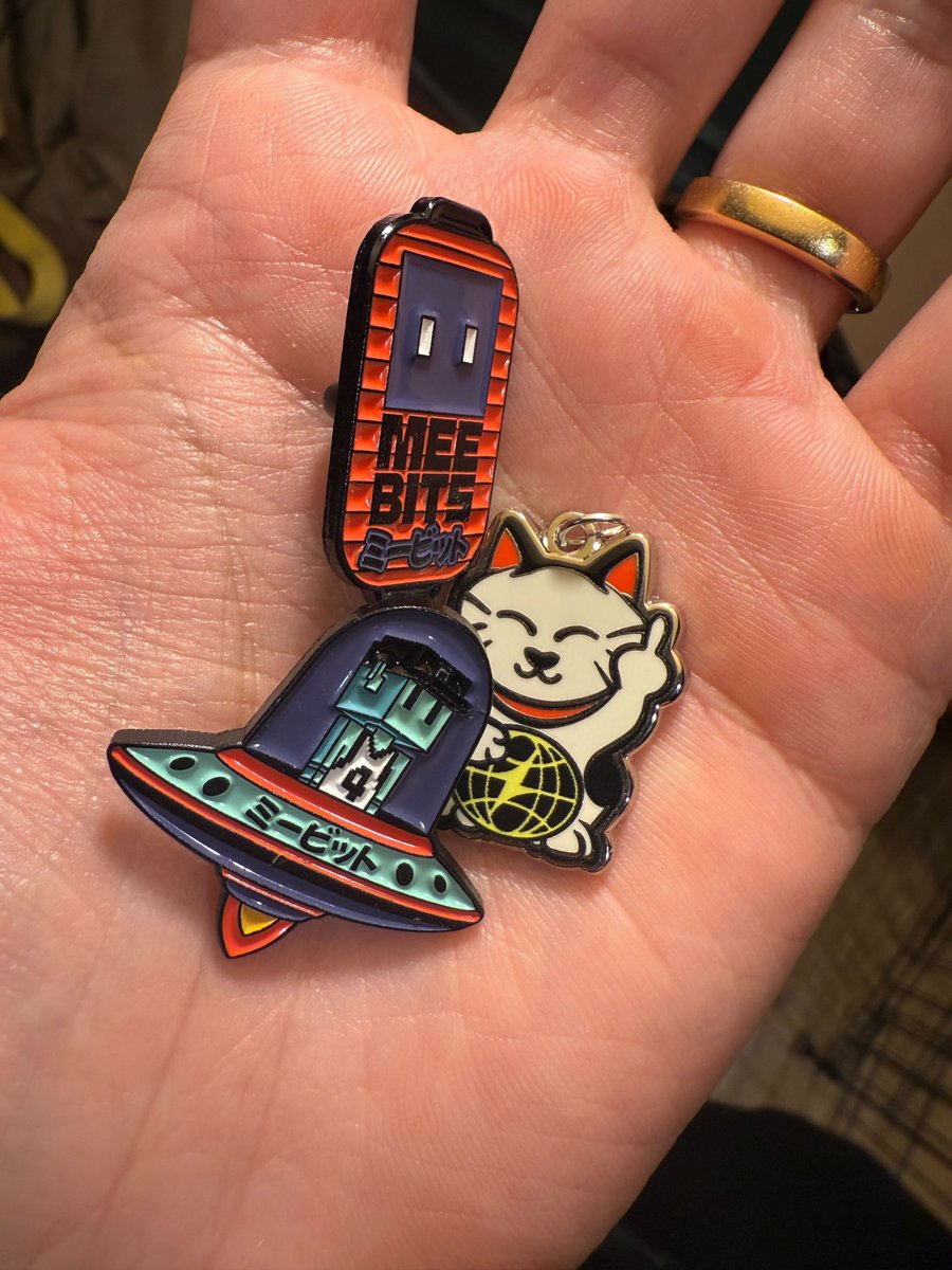 fun merch delivery day @moonbirds charm (little cat flipping the bird) +  @MeebitsNFTs pins
