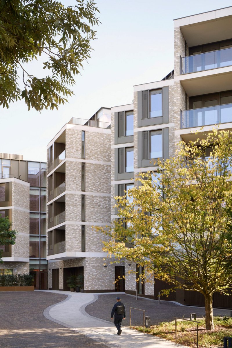 dezeen's tweet image. Stanton Williams creates faceted retirement complex in Hampstead: dezeen.com/2025/11/13/sta…