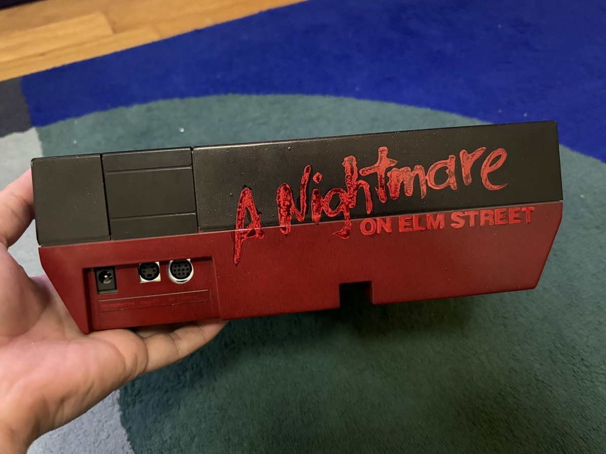 What a throwback! NESRGB kit with the NES I/O no cut power module board, and <a href="/BlueShell3D/">BlueShell 🐋</a> Ninten-Drawer cartridge slot installed on a custom Nightmare on Elm Street original NES console! Play your games in crispy ass RGB display with the cleanest picture possible, while using