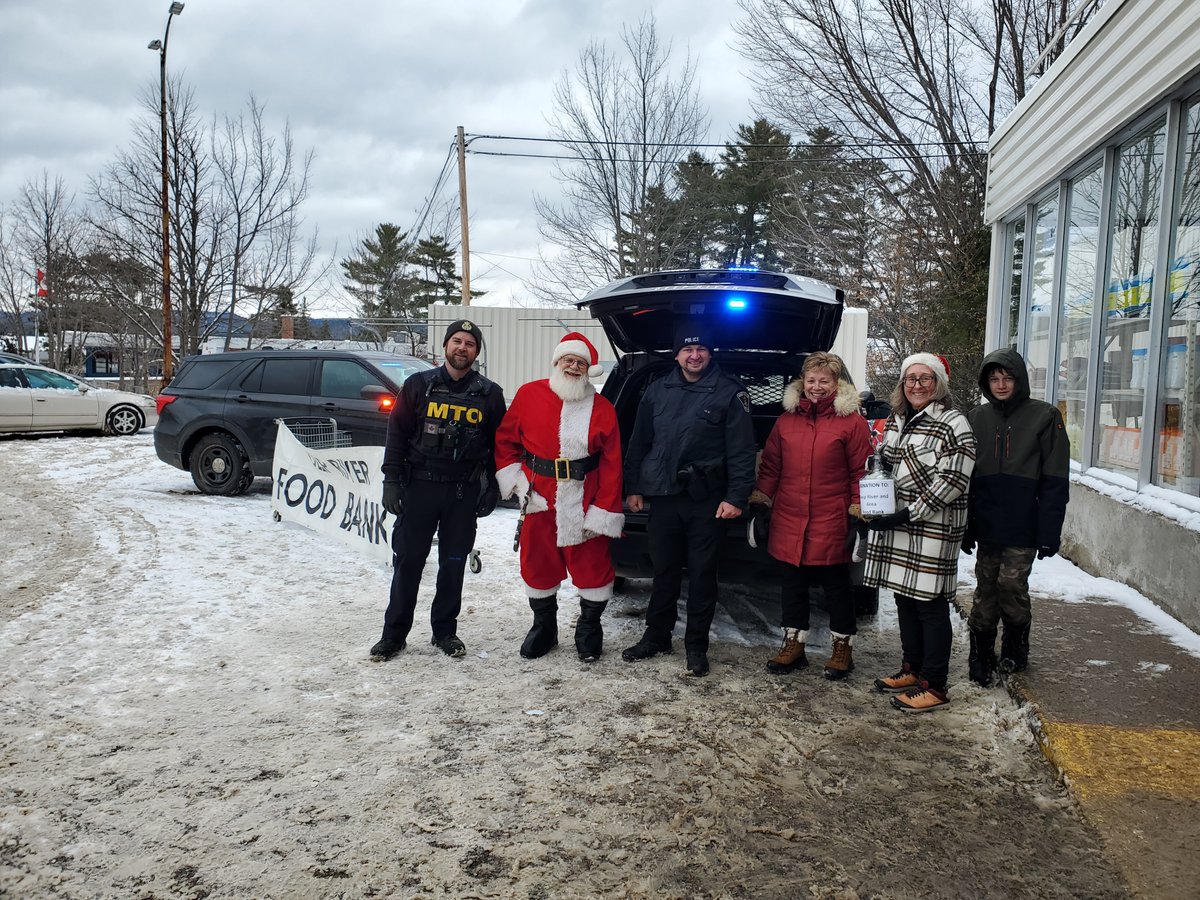 Deep_River_PS's tweet photo. The Deep River Police Service held its annual Cram the Cruiser event to collect food and cash donations for the local Deep River and Area Food Bank.  With the generous donations of community members, there was a total $5018.40 collected in cash and 40 banana boxes of food. https://t.co/LujiFVtEsf
