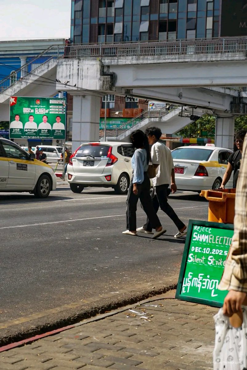 minn_robert's tweet photo. Signs from Yangon’s People’s Strike appeared downtown today, calling on everyone to join tomorrow’s nationwide Silent Strike against the junta’s sham election.

#SilentStrike #WhatsHappeningInMyanmar https://t.co/LazGqk2RZ0