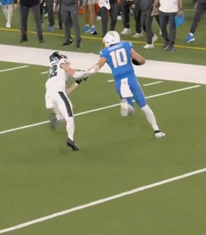 with the left hand ????