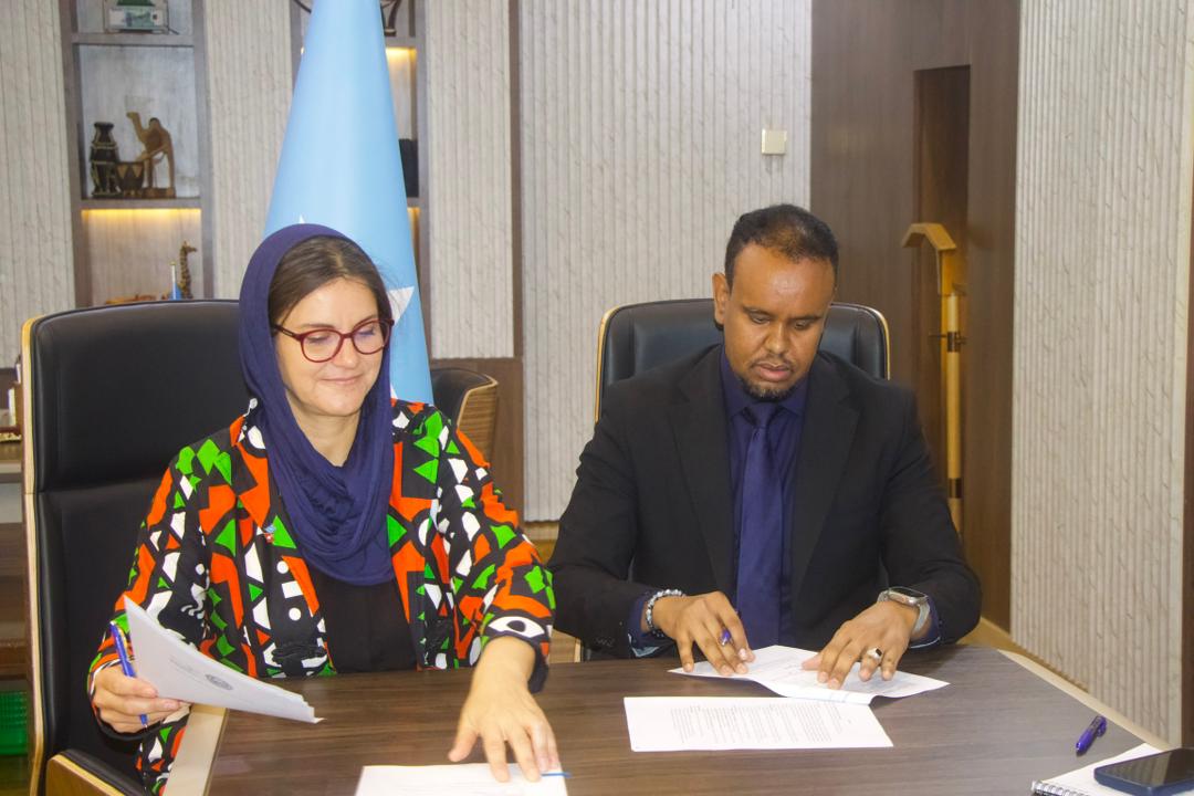 NBS_Somalia's tweet photo. Somalia & Switzerland Launch Pilot Project on Strengthening National Statistical Capacity

Somalia National Bureau of Statistics & Swiss Development Cooperation, today signed a partnership agreement to launch the Pilot Project on Strengthening National Statistical Capacity. The ceremony was officiated & formally signed by Federal Minister of @MoF_Somalia, H.E. @BihiEgeh on behalf of the Federal Government. DG Dr. Abdisalam Mohamed @AbdisalamHumbul signed for #SNBS, while Ms. Martina Durrer, Regional Head of International Cooperation at the Embassy of Switzerland (Horn of Africa), signed for @SwissDevCoop.

This pilot marks a major milestone as it will be implemented through country systems, with SDC channeling project funds directly through the Federal Government Treasury. SNBS is proud to be the first national institution to deliver a project under this modality—manifestation of growing international confidence in Somalia’s public financial management & institutional systems.

The initiative strengthens use of official statistics in academic research & evidence-based policymaking nationwide. Through capacity-building for university faculty & students, improved data access & joint research programs, the project will expand the use of key SNBS datasets, including SHDS, SHIBS, SIBEC & Labour Force Survey.

Through stronger collaboration between academia, policymakers & the public, the partnership promotes data-driven dialogue & annual research-policy forums aligned with national priorities. SNBS welcomes this important cooperation with the Government of Switzerland, which will enhance national capacities, deepen research engagement & advance Somalia’s commitment to a more data-literate & evidence-driven society. @abdirahm_omar
