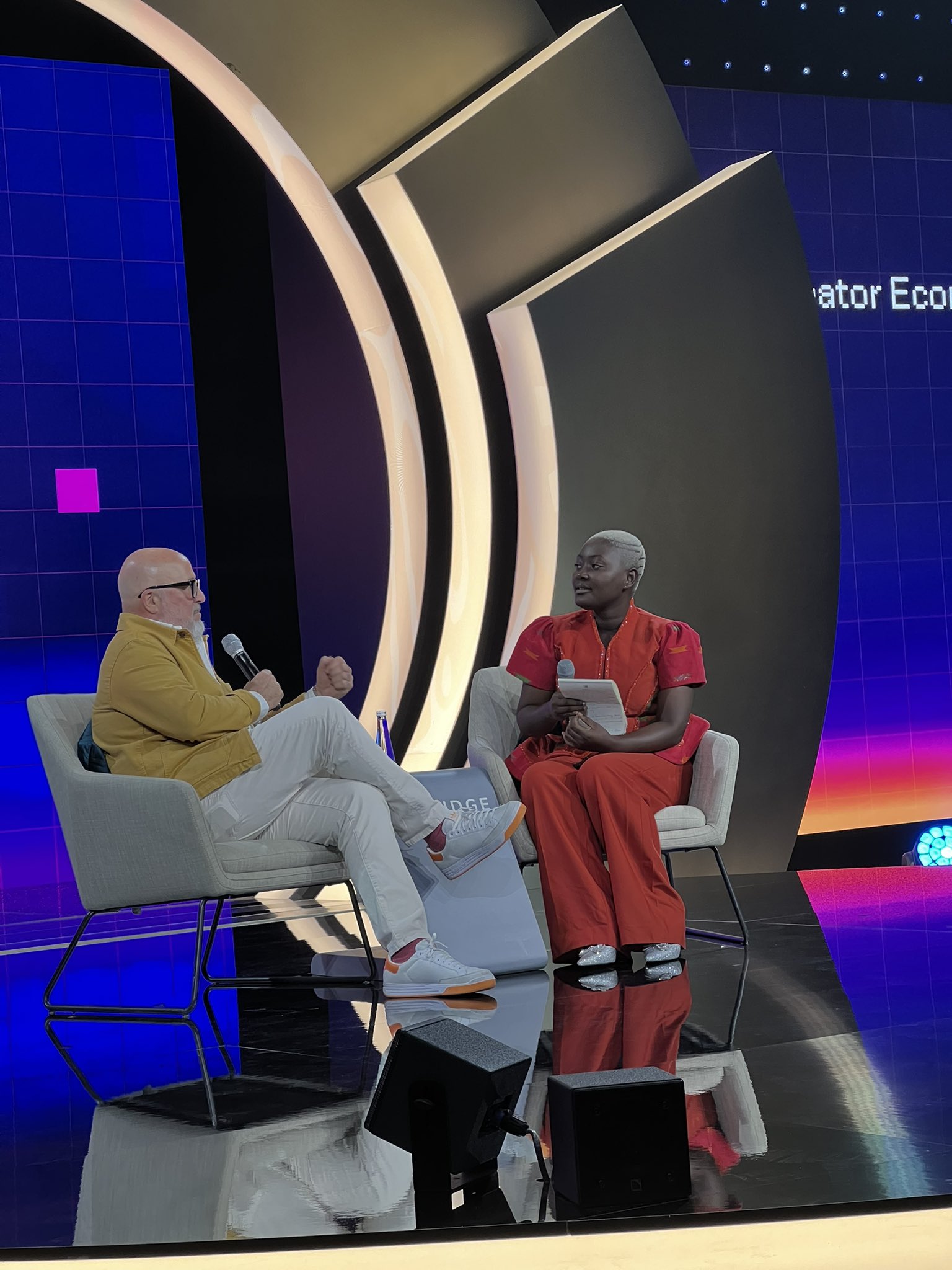 Chef Abby in a fireside chat with the Chef Andrew Zimmern at the BRIDGE Summit, Abu Dhabi, UAE.