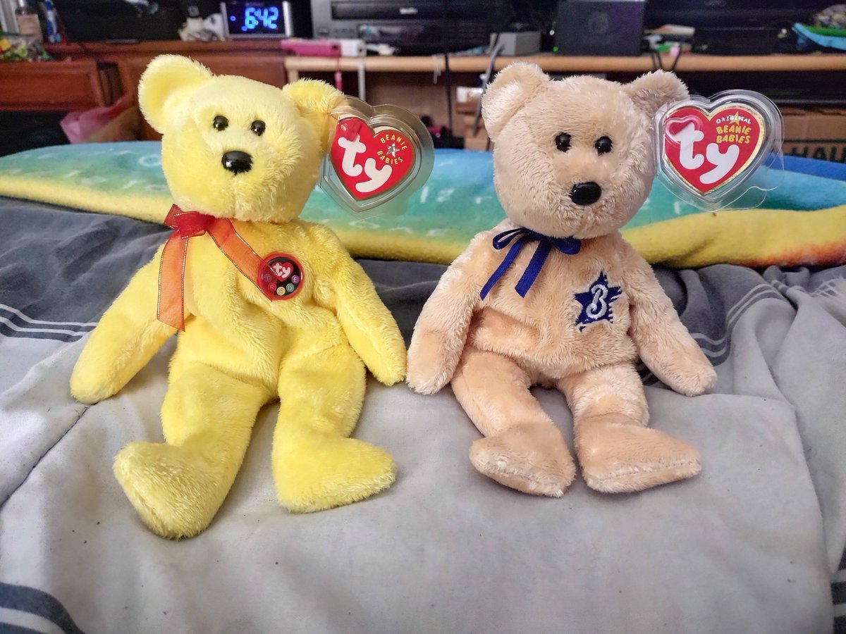 DatasBestFriend's tweet image. Picked up some interesting Beanie Babies at an antiques fair last weekend.

Yellow: Tradee, 2000, badge says "TRADE". Online exclusive from the opening of the official Beanie Baby trading website.

Tan: winstar, 2006, Japanese exclusive, odd since it has the letter B on it.
