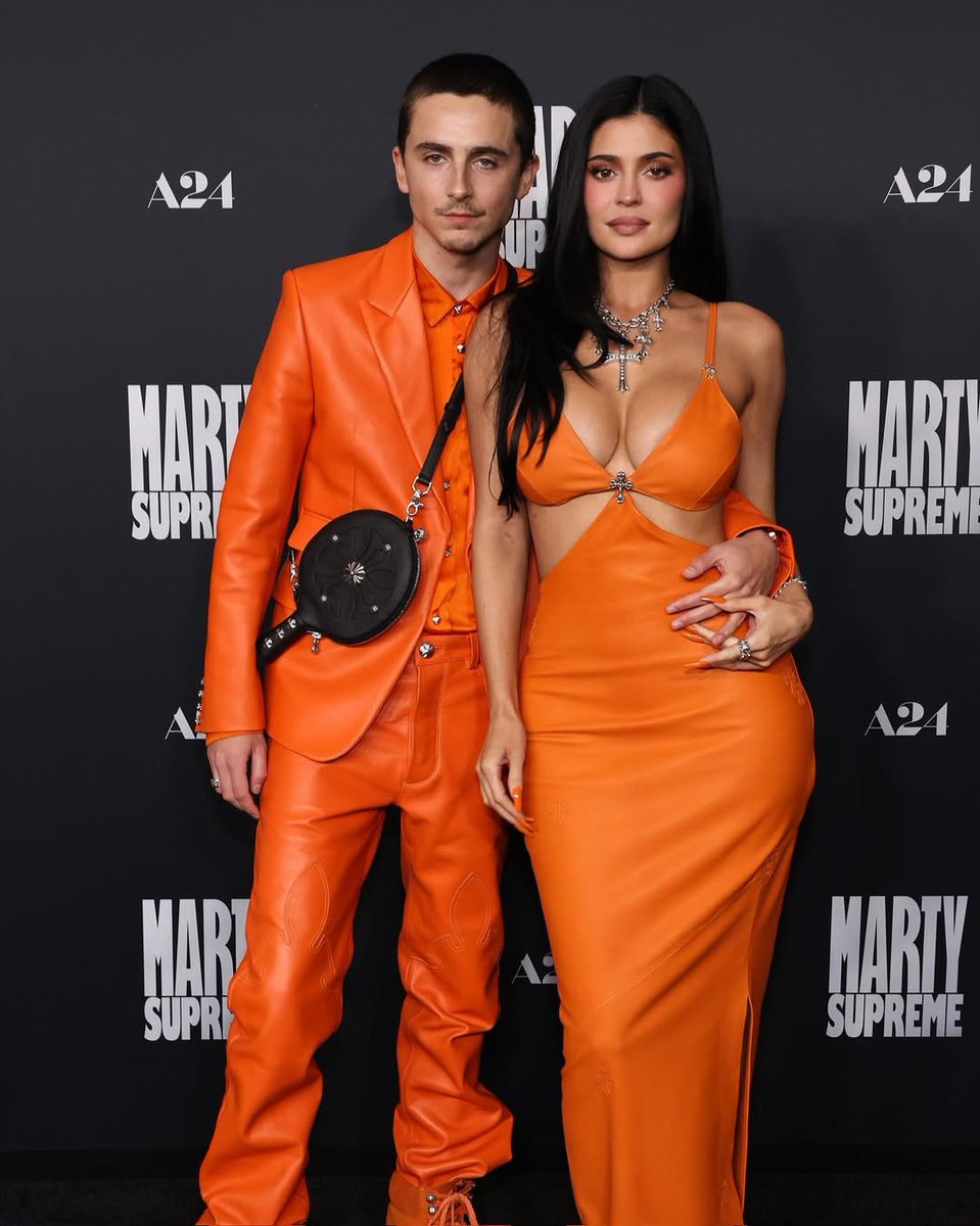 theNETng's tweet image. Timothée Chalamet and Kylie Jenner step out in matching orange outfits as they attend the ‘Marty Supreme’ premiere 🧡

#trending #kardashian