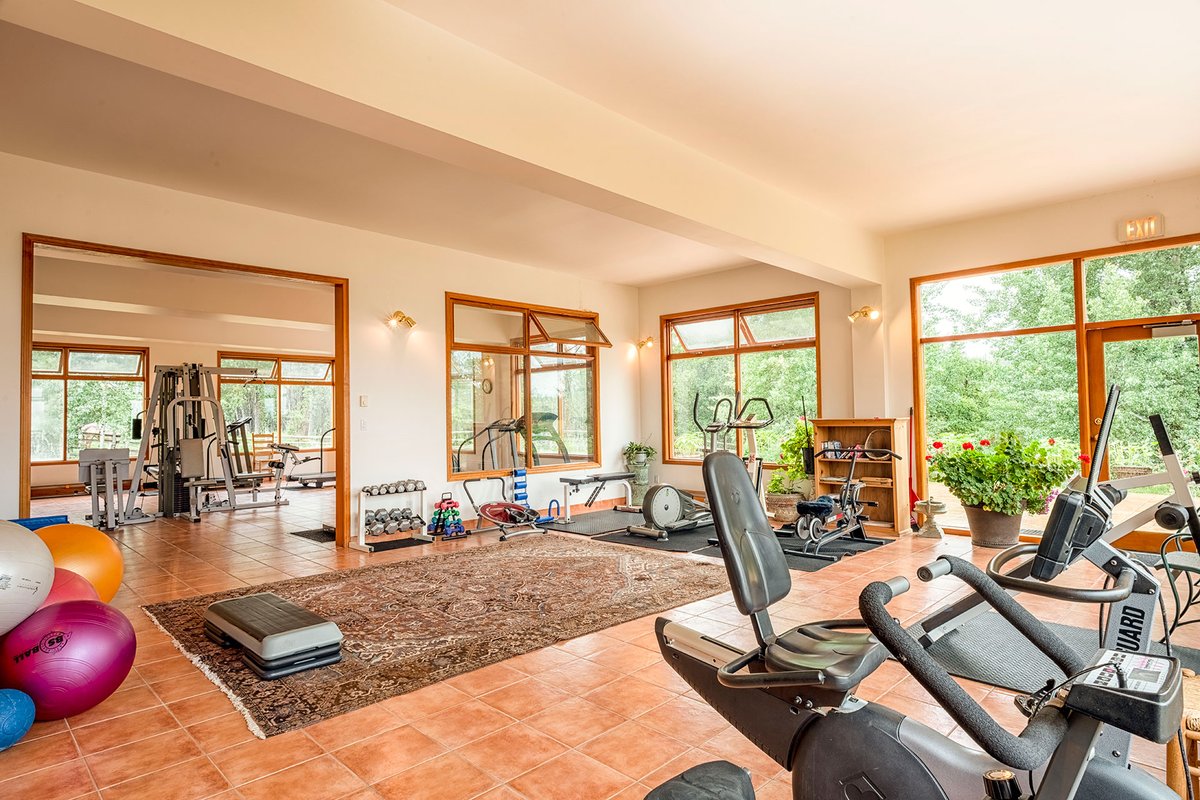 EVranch's tweet image. Our well-equipped Fitness Room awaits with a hillside view. evranch.com