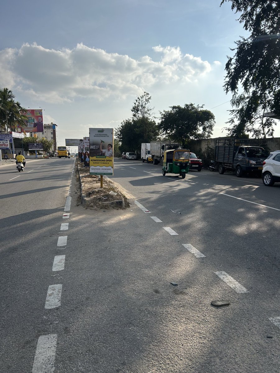 aryantune's tweet photo. This advertisement board placed on the median near Bannerghatta EuroSchool is blocking the view of oncoming traffic from the opposite side,creating a serious blind spot on a fast,Requesting authorities to urgently remove this board before it cause a major accident
@GBAChiefComm https://t.co/80Z6CdGvet