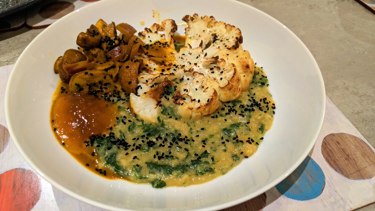 Indian night..homemade yellow split dhal with spinach, spicy mushrooms, cauliflower steak, nigella seeds, chutney and wraps (out of shot) #Vegan #Crueltyfree 😋🌱🌻😊