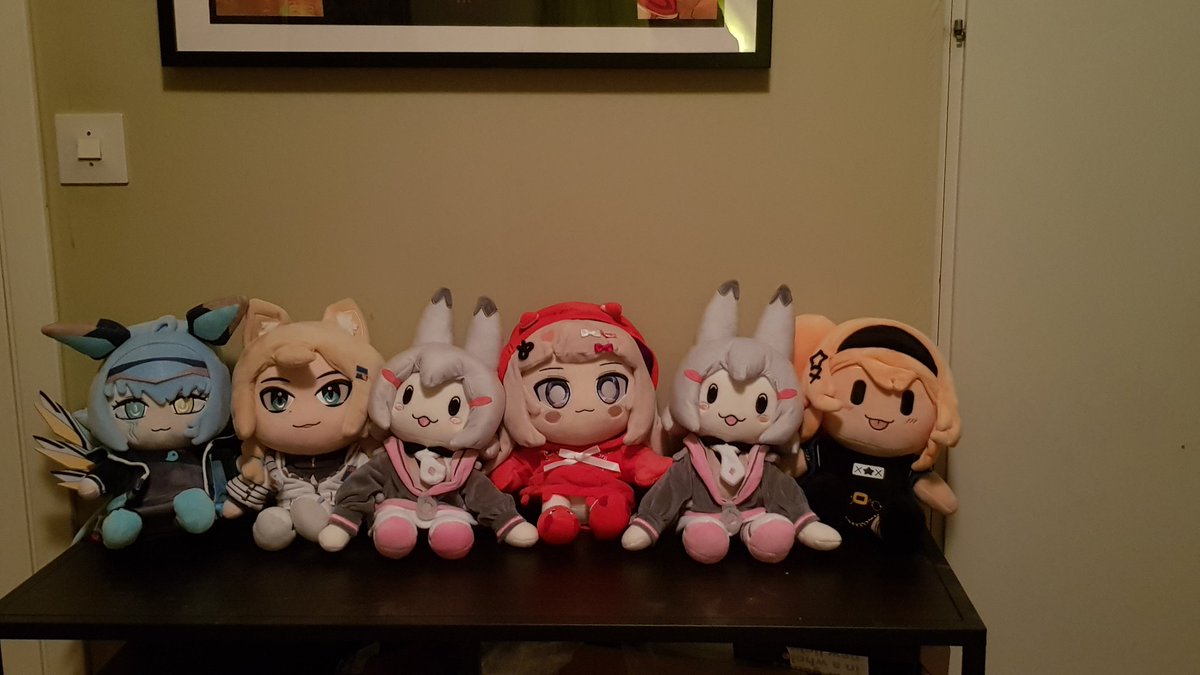 sixshotsavior's tweet photo. #10mashrine My humble and small (but growing) Vtuber plushie collection. I have still to get the proper shelving (have at least 4 more on the way) so enjoy this scuffed former TV table lineup. https://t.co/W32eqGc3IQ