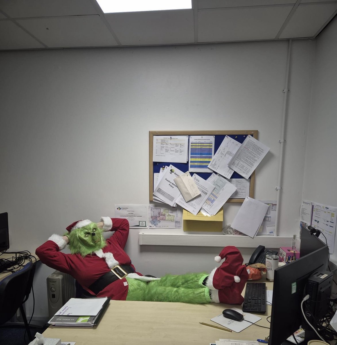 Miss Bailey looks a little different these days. I don’t think she will be happy with the grinch’s dirty feet on her desk.