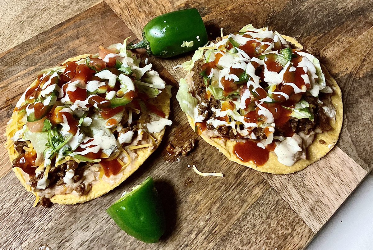 Beef and bean tostadas. Cheese, pico, fresh jalapeno. A smoked red pepper sauce. Jalapeño sour cream sauce with <a href="/DadsSeasonings/">Dad’s Seasonings</a> Classic American Hatched and <a href="/HeathRilesBBQ/">Heath Riles</a> Garlic Jalpeno. If this ain’t taco Tuesday?  Come on now. 
<a href="/tacokingX/">Taco King 𝕏</a>
