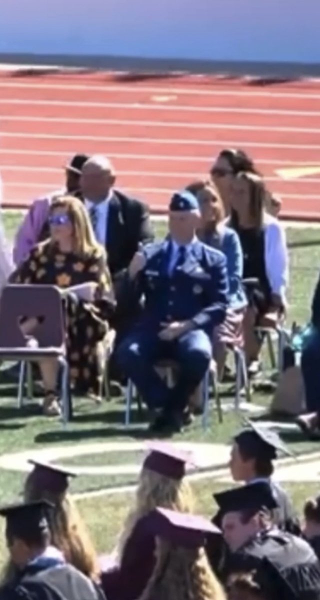 PnutGalaree's tweet image. Ummm… probably just a random coincidence… but, does anyone recall this one audience attendee (possibly higher ranked military brass) at Tyler Robinson’s 2021 H.S. Graduation? 🤔

He was obviously there for Tyler, considering he acknowledged him with a ‘thumbs up’ salute.🫡 👀