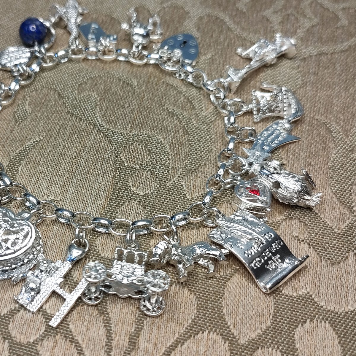 シルバーヴィンテージチャームブレスレット英国展 トゥーシェ