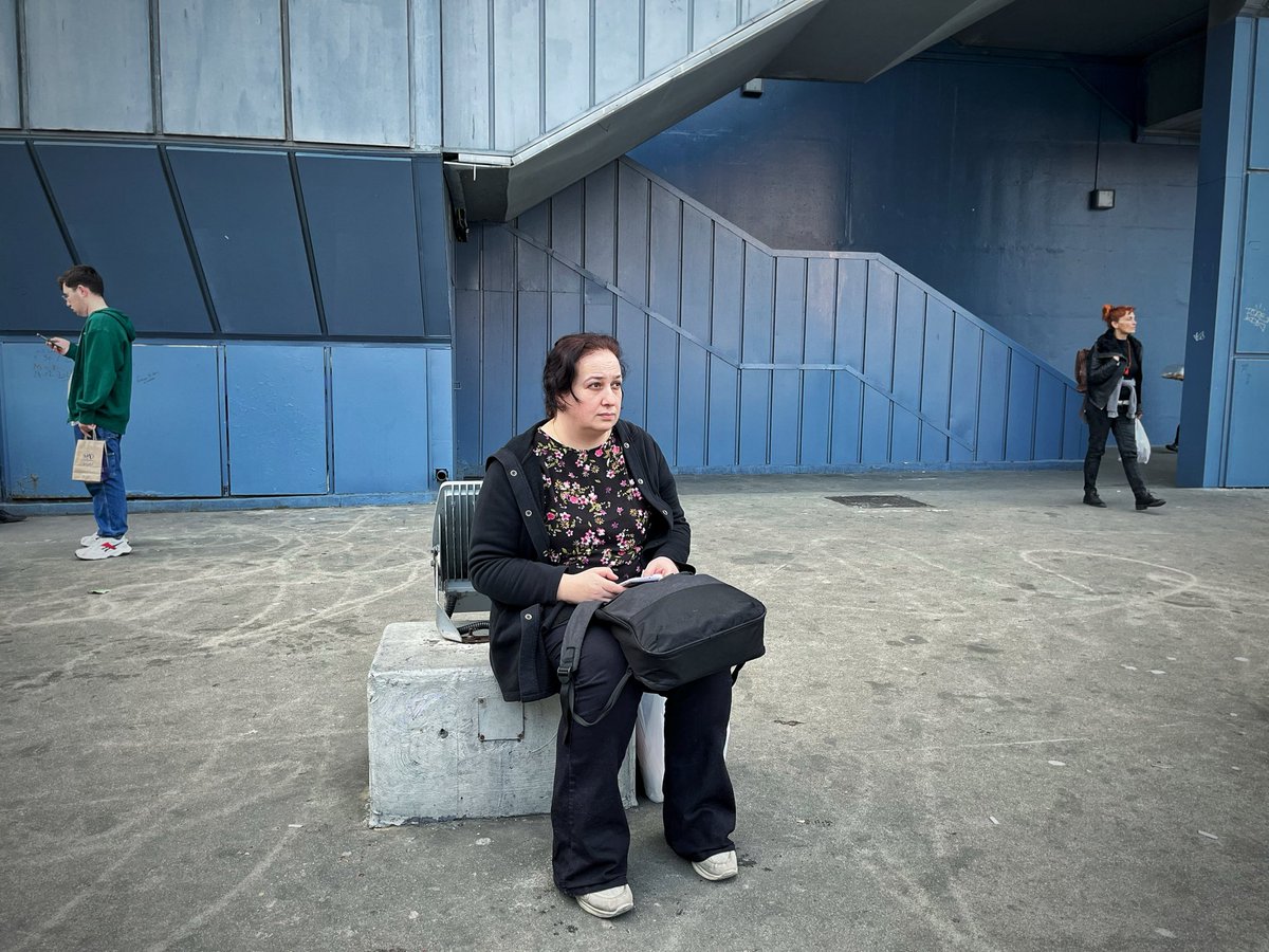 GM
She was carrying the weight of an entire afternoon on her shoulders.