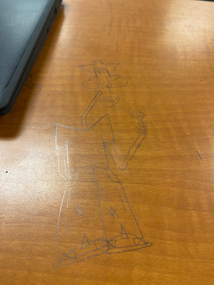 some kid drew this on a desk like 6 years ago