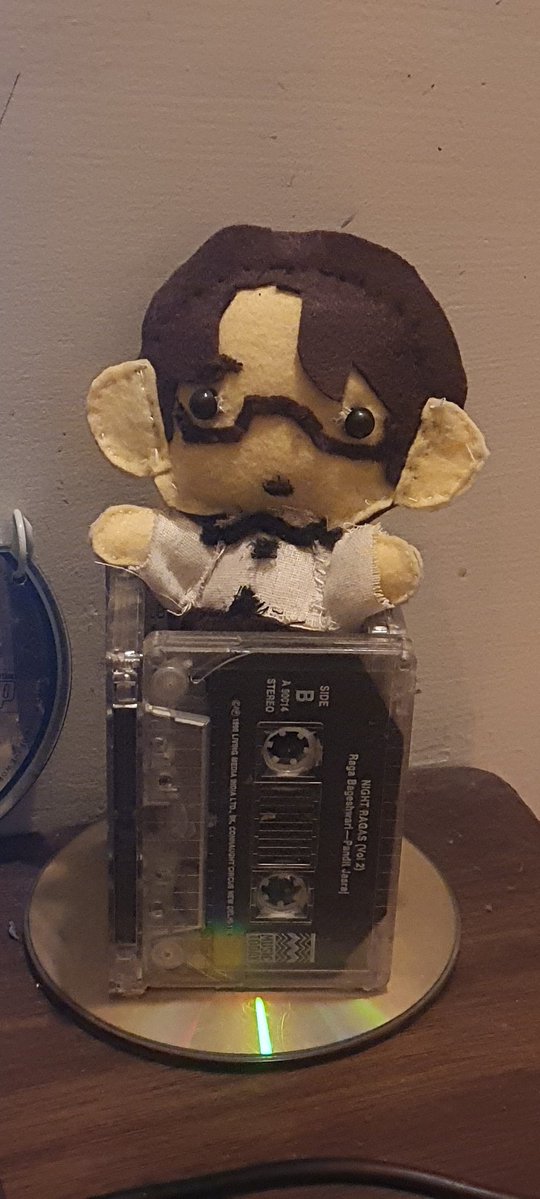 im no good at sewing. but i made a little satomi out of scrap fabric (m felt i bought for this purpose). i keep him in my pen stand on my desk for emotional support. it doesnt look like him very much but i was blessed w the power of imagination
