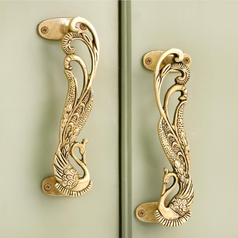 LeoDaVinciWave's tweet image. Brass Decorative Peacock Door Handles.