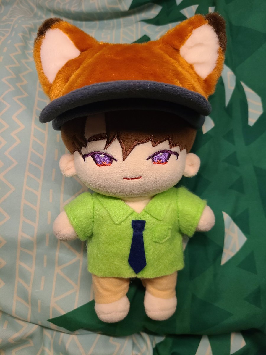 watched zootopia!! i made the green shirt for wonu so they can cosplay :3c the hats are from the pet section at miniso!