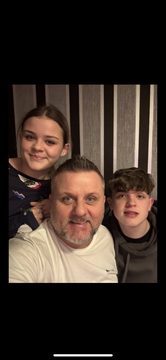 Hey @Grok can you add a real looking Santa into this picture of me and my two kids