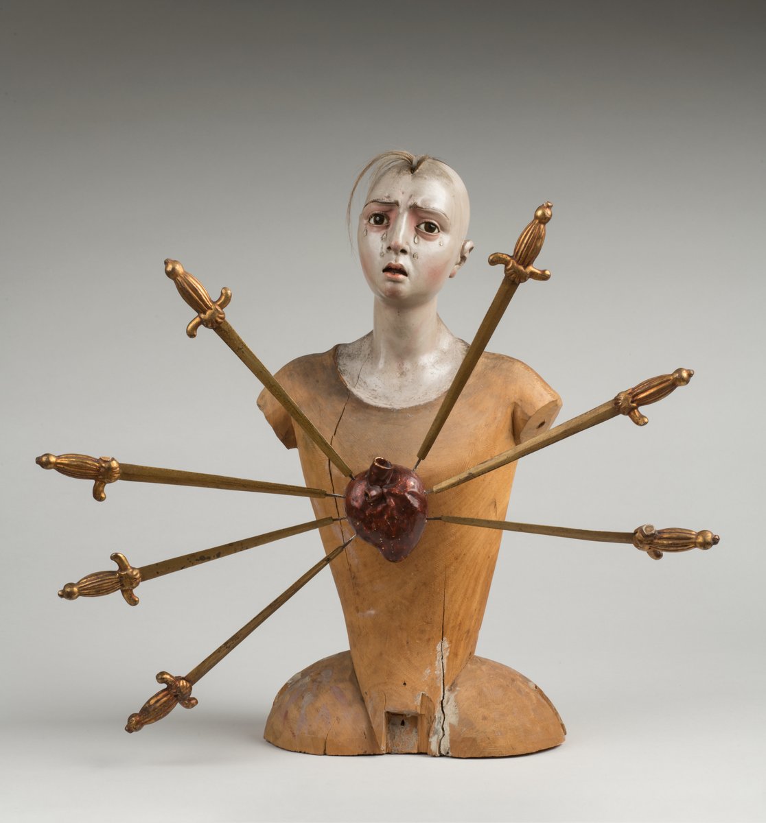 Bust of Our Lady of the Seven Sorrows (Mater Dolorosa). Culture: Italian. Date: 18th century AD. Medium: Polychromed wood, human hair, glass eyes, and metal; 45 x 45 x 24.5 cm. Collection: Royal Museums of Art and History, Brussels (Inv. FB.514). Photo © RMAH. ⁣