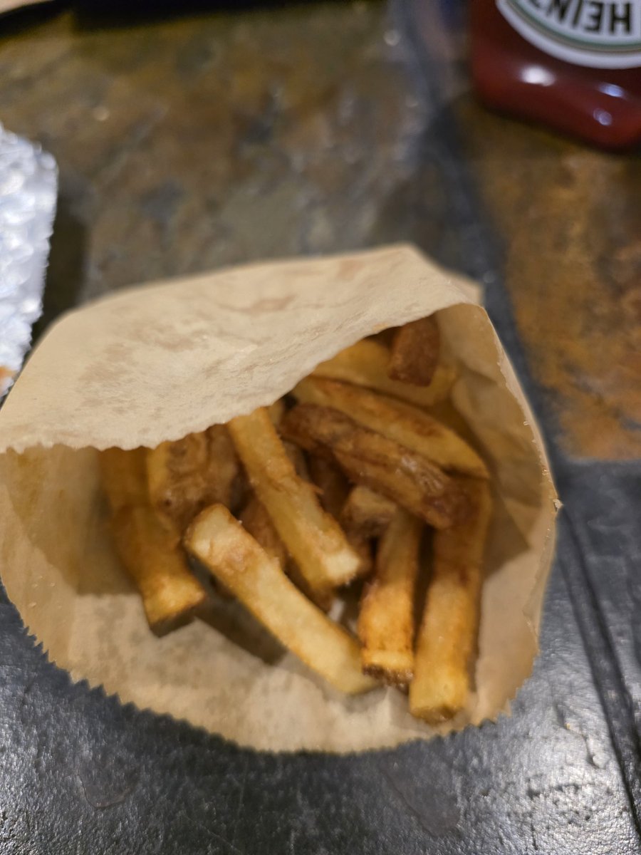 Wow <a href="/FiveGuys/">Five Guys</a> this is your 'regular fries' now for $7? This is embarrassing.