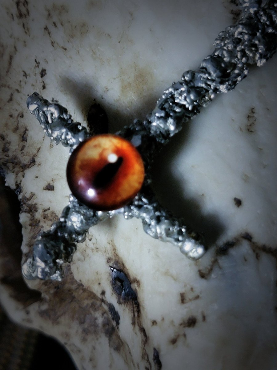Tombthread666's tweet image. Infernal Vigil – Molten Draconis Cross

Handmade inverted cross necklace with a molten, infernal aesthetic.
Each piece is shaped by hand, giving it an intentionally rough and organic surface that evokes forged metal rather than polished jewelry.