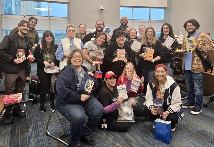 MaryCarrollHigh's tweet photo. Our Hug in a Mug ☕️ + Book Exchange 📖 was fully booked. 

No overdue fines, no shushing—just holiday cheer in circulation. 😉🐅💙

#BetterAtCarroll #LibrarianHumor #HugInAMug #BookExchange #HolidayReads #TPND https://t.co/mFKqX14djg