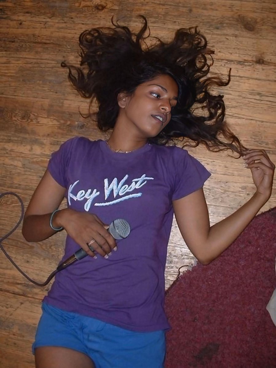 rogue's tweet image. M.I.A photographed in the early 2000s