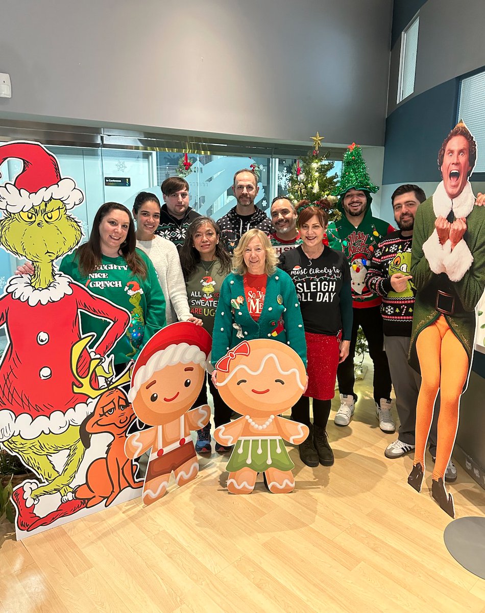 Ugly sweaters on. Team spirit turned all the way up. 🎄🧶