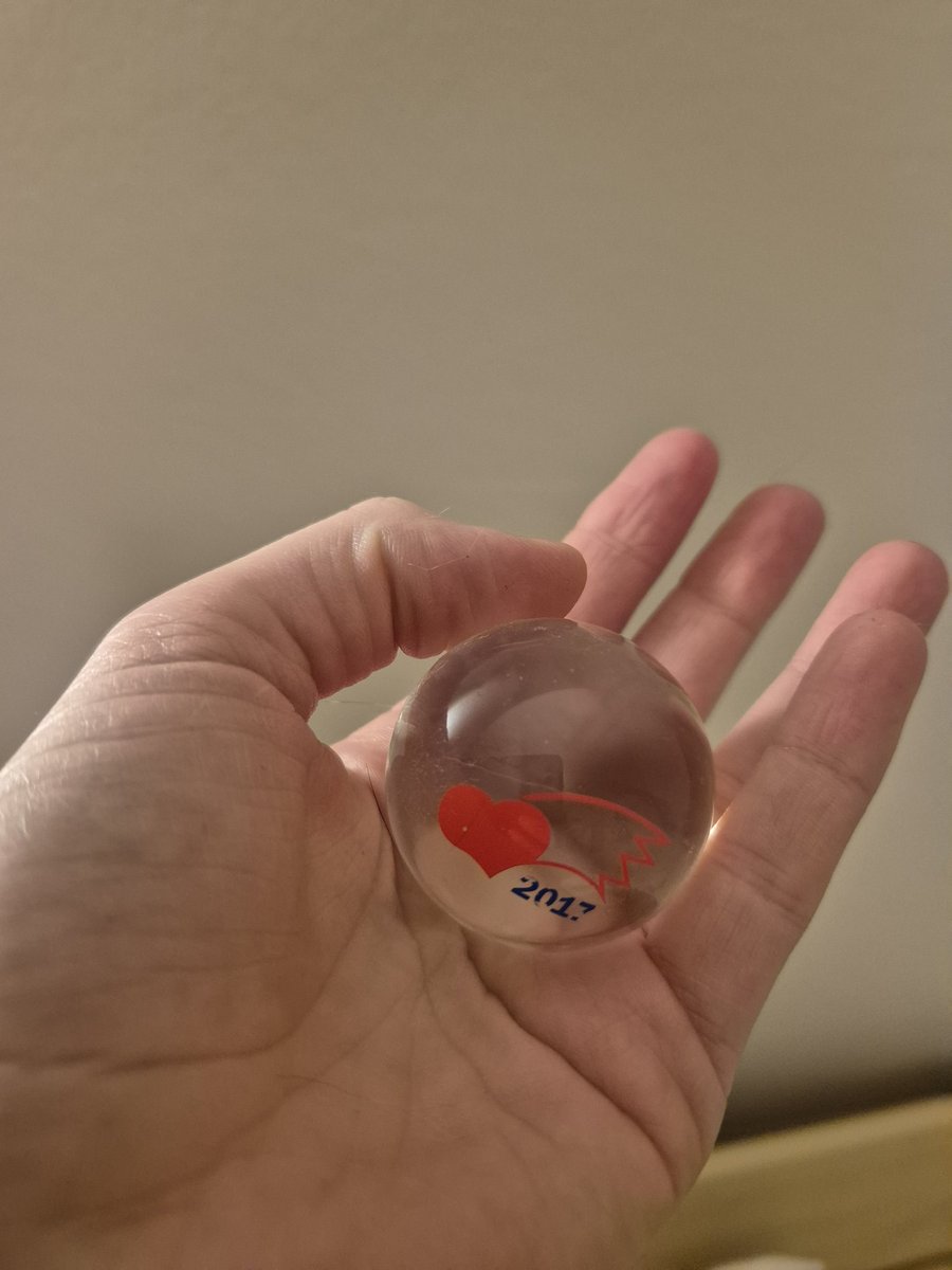 There is an hourglass near the crocodile. Surely that means Strike and Robin are visiting the Czech city of Brno and catching the glass ball at the astronomical clock (the L is optional) in náměstí Svobody.