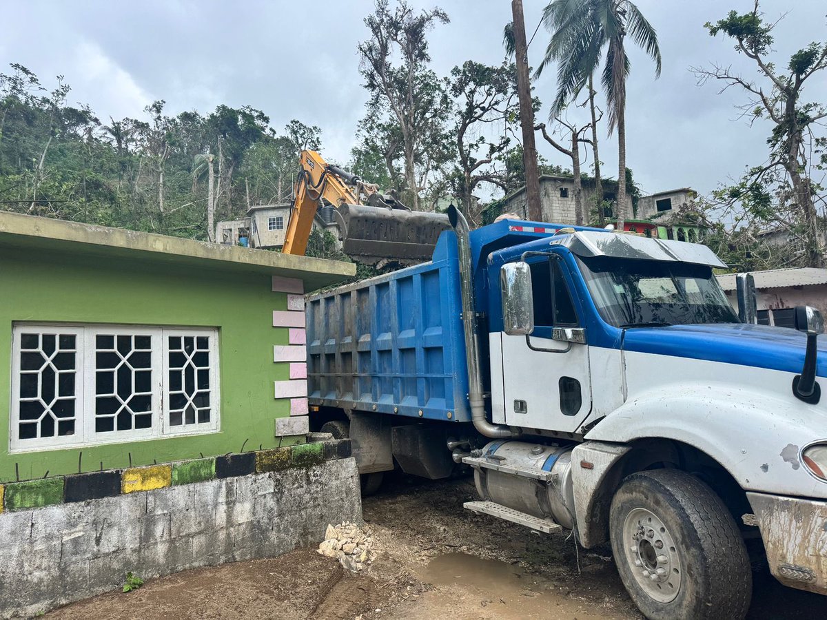 NestaJA's tweet image. Drain cleaning works are currently underway in John’s Hall, from Fairfield to Point. This river runs along the main road in John’s Hall and, regrettably, was the drain that claimed a life after the hurricane.