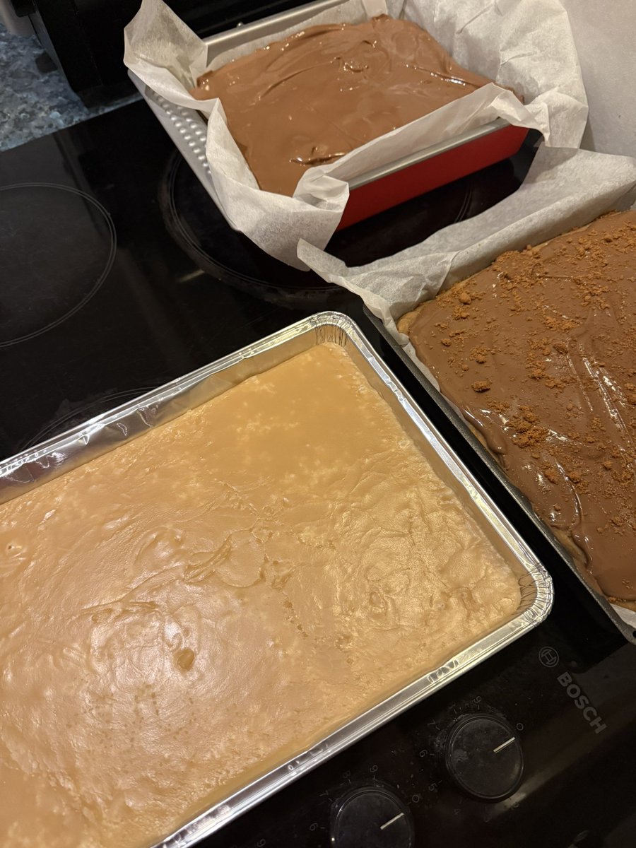 Groovy_ness's tweet image. Colin keeping an eye on the Christmas baking - gingerbread, tablet, biscoff fudge, peanut butter fudge, base of a trifle and a banoffee pie. #fatty