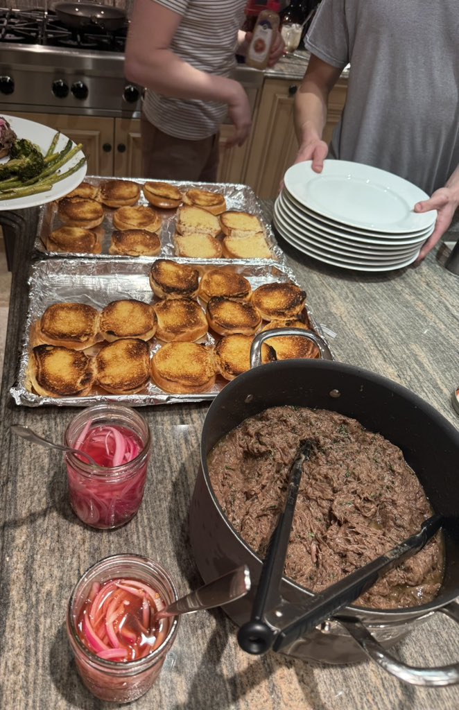 Sloppy Joes, but make them fancy! 48 hour wine and mustard braised wagyu, with some pickled onions and butter-toasted buns.