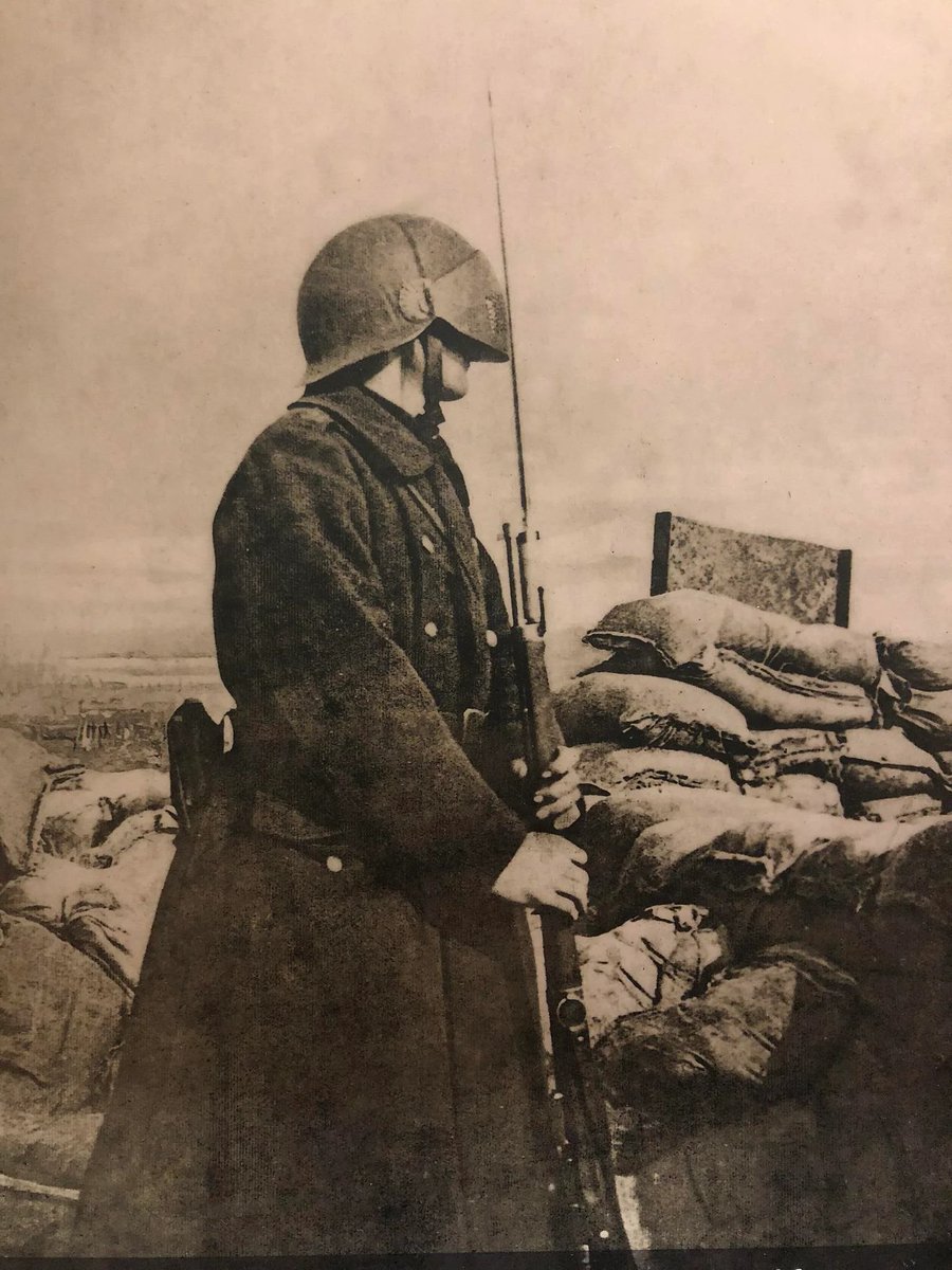 Procariama1's tweet image. this photo of one in use on the front is one of my favourites from the belgians. love the helmet + greatcoat + bayonet. i do also like their top hats though
